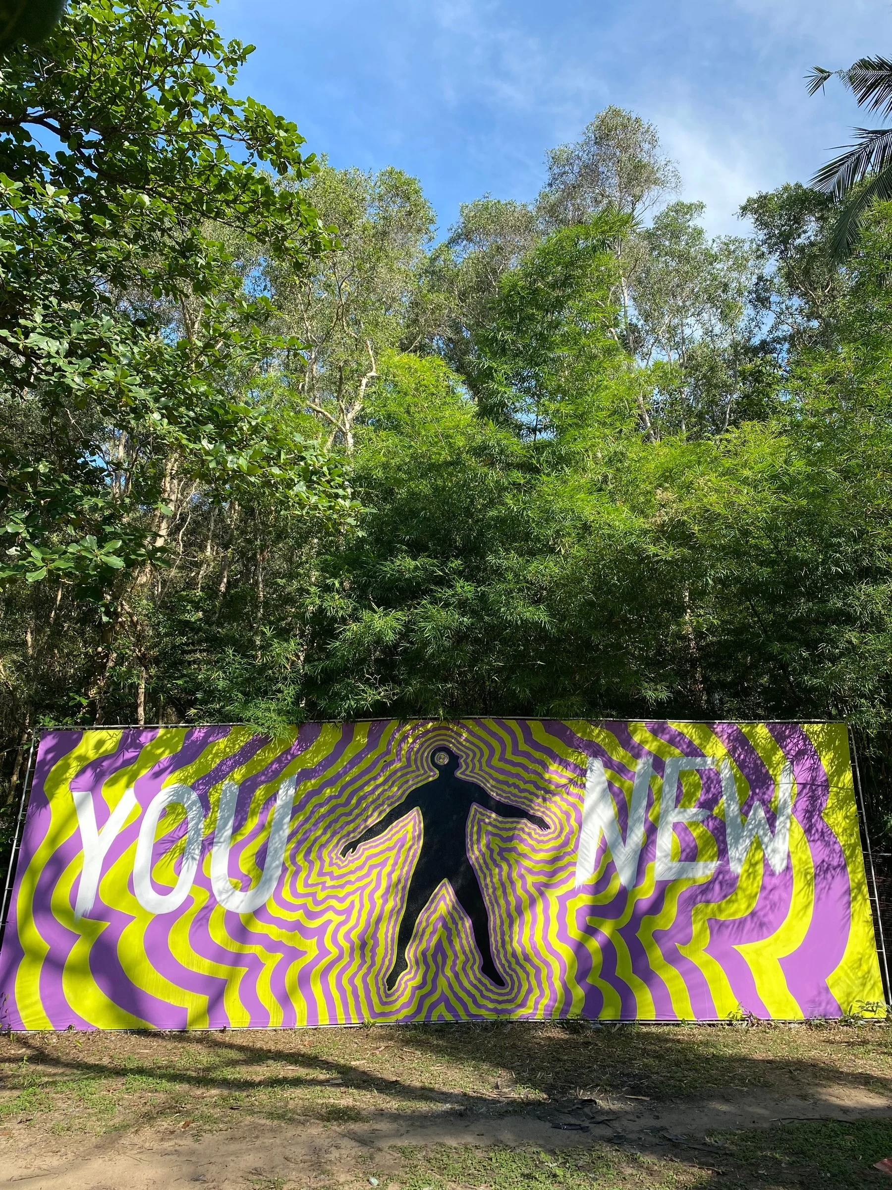 Renewal: a large banner with a figure in yellow-and-violet waves and the words You New